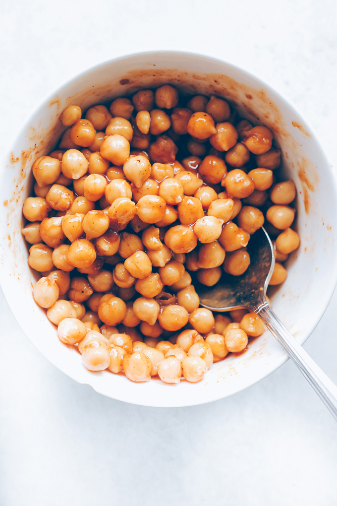 Vegan BBQ Chickpea Pizzas - BBQ coated chickpeas on top of melty vegan mozzarella cheese and loaded with so much goodness, makes this vegan pizza night a keeper! NeuroticMommy.com #veganpizza