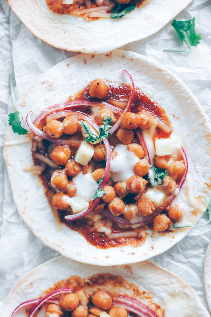 Vegan BBQ Chickpea Pizzas - BBQ coated chickpeas on top of melty vegan mozzarella cheese and loaded with so much goodness, makes this vegan pizza night a keeper! NeuroticMommy.com #veganpizza