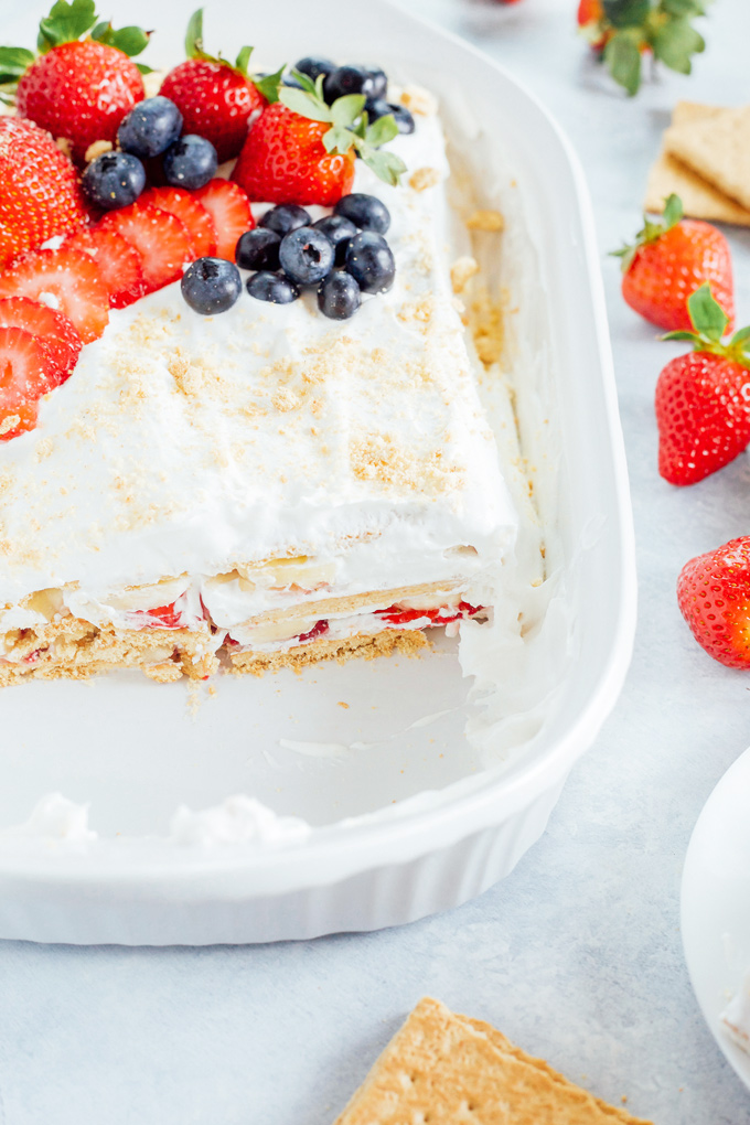 Vegan Strawberry Banana Icebox Cake - One of my fave spring/summer desserts. Generously filled with coconut whip cream and fresh strawberries and bananas this delightful dessert is easy, super tasty, refreshing, and somewhat on the healthier side! NeuroticMommy.com #vegan #spring #iceboxcake