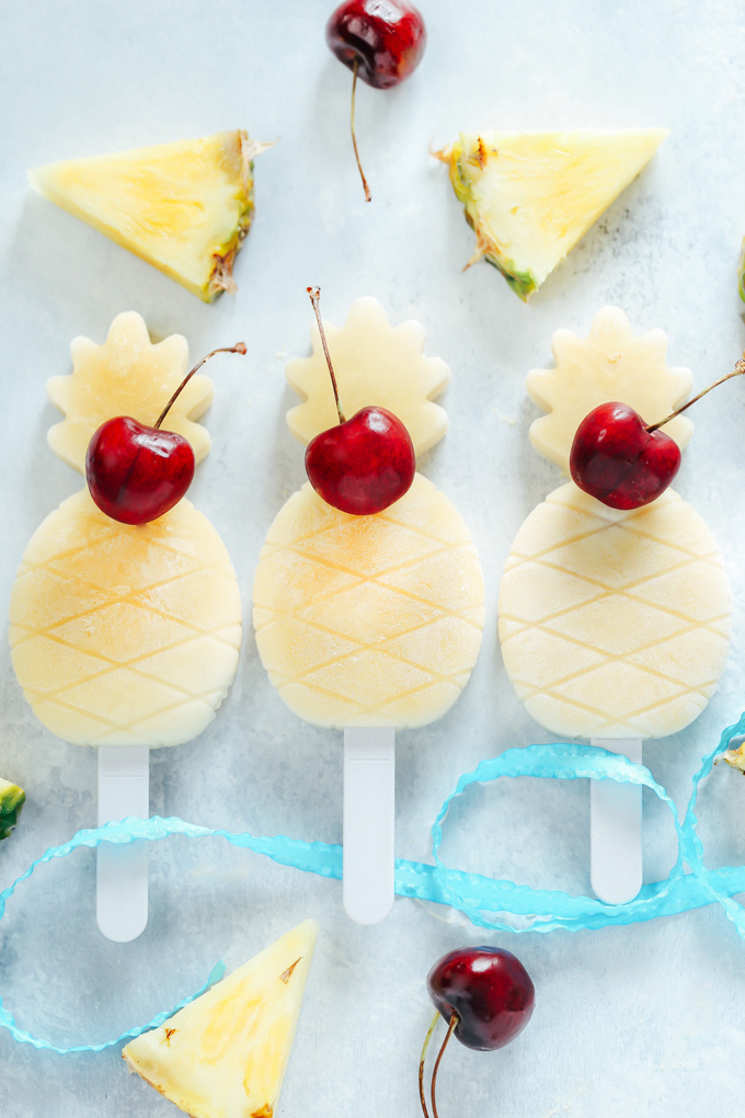 Dole Piña Colada Ice Pops - A charming classic that's super easy to make, refreshingly sweet and delicious as ever. NeuroticMommy.com #healthysnacks #vegan #pinacolada