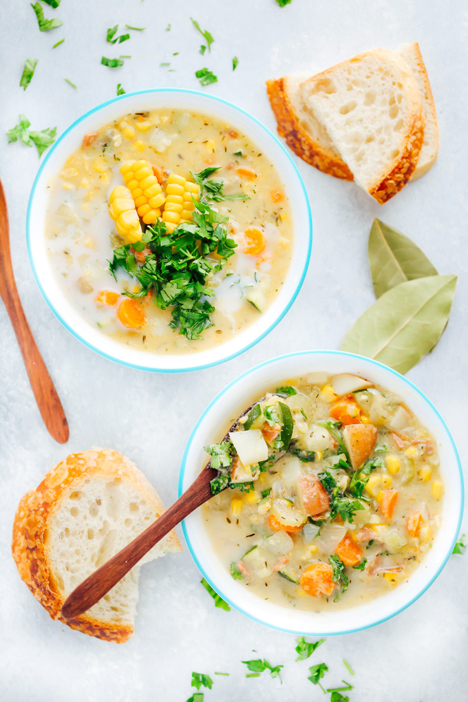 Creamy vegan chowder loaded with corn, zucchini and other herbs and veggies. This lightened up version is perfect for summer. NeuroticMommy.com #vegan