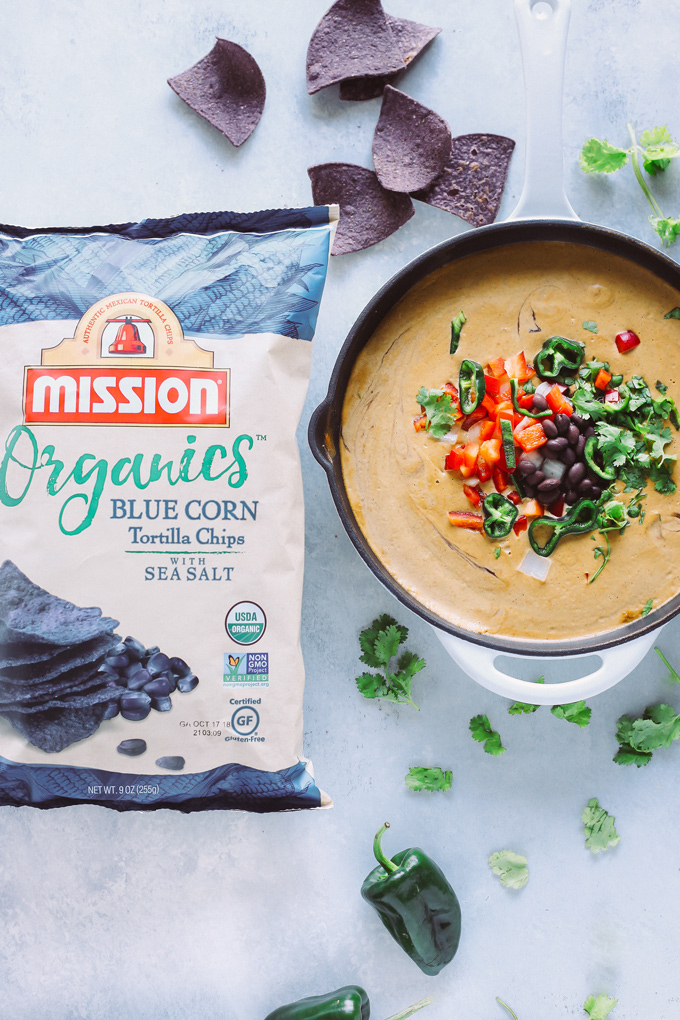 Vegan Poblano Black Bean Queso Dip is anything but basic. Loaded with all sorts of fresh goodness turned into a creamy, melty, luscious cheese dip perfect for all your dunking needs. NeuroticMommy.com #veganqueso #dip