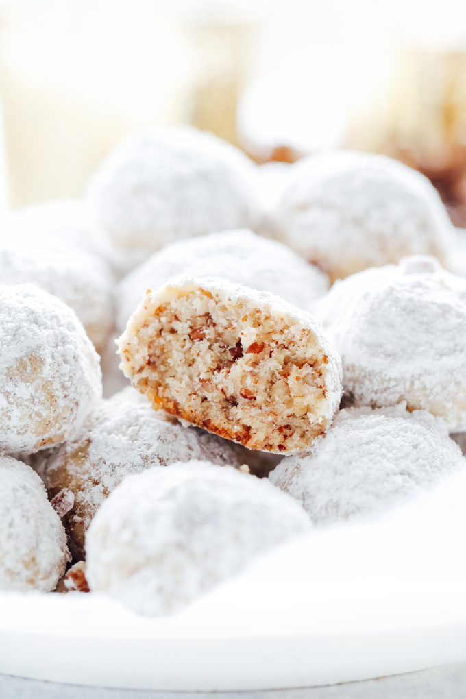 Vegan Snowball Cookies - Buttery and delicious pecan shortbread cookies coated in powered sugar. The perfect addition to your cookie boxes and holiday gatherings. NeuroticMommy.com #vegan #christmascookies #cookies 