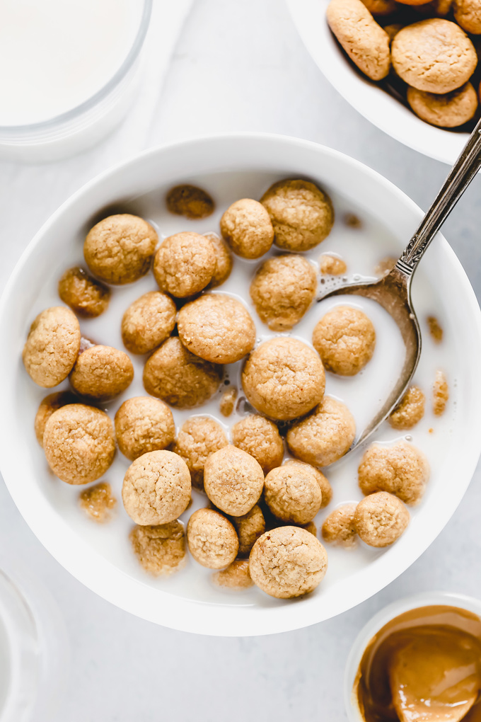 Homemade Peanut Butter Crunch Cereal - People look forward to breakfast and it can be the most important meal of the day for some, make it special by adding these homemade peanut butter gems to the mix. NeuroticMommy.com #vegan #cereal #homemade