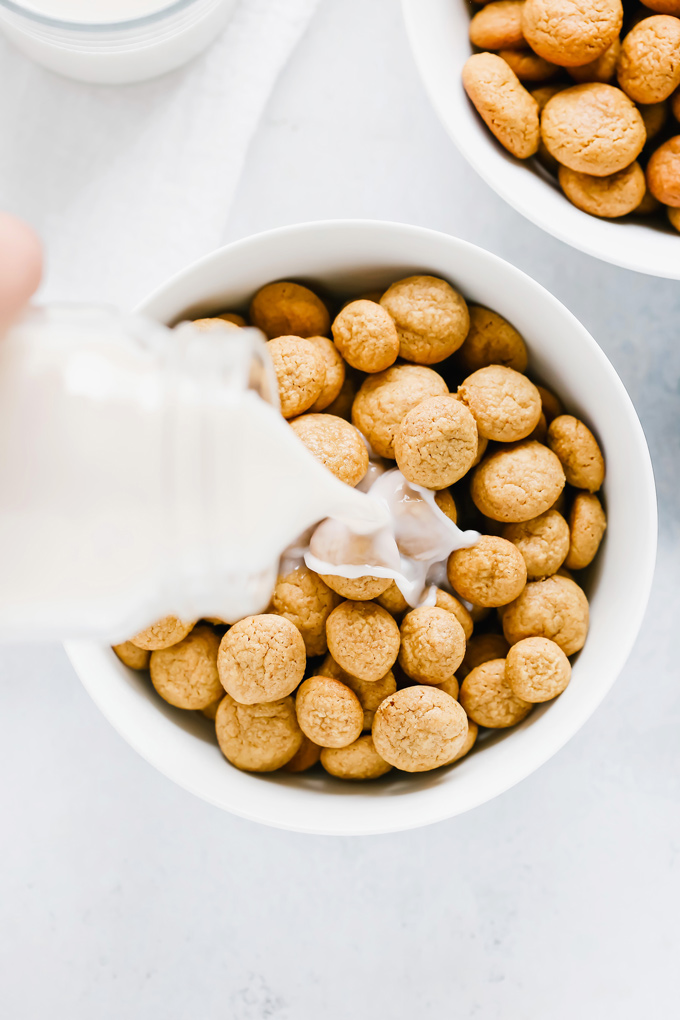 Homemade Peanut Butter Crunch Cereal - People look forward to breakfast and it can be the most important meal of the day for some, make it special by adding these homemade peanut butter gems to the mix. NeuroticMommy.com #vegan #cereal #homemade