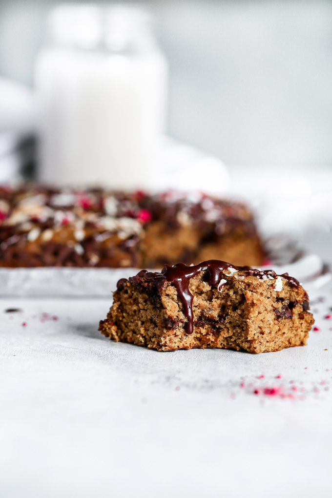 Chocolate Chip Coconut Bars - Enjoy straight from the oven while the bars are still warm & the chocolate chips are super melty. NeuroticMommy.com #vegan #chocolatechip