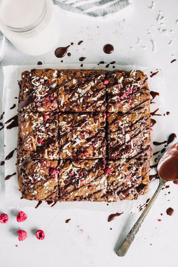 Chocolate Chip Coconut Bars - Enjoy straight from the oven while the bars are still warm & the chocolate chips are super melty. NeuroticMommy.com #vegan #chocolatechip