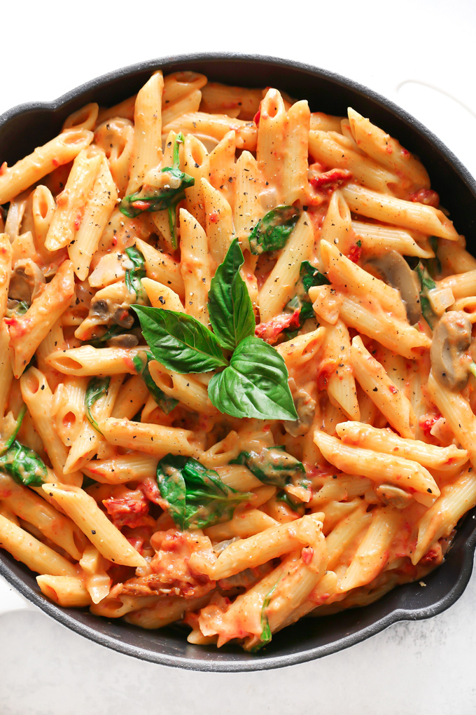 Vegan Sun-dried Tomato Basil Pasta - Just a few ingredients make up this luxuriously creamy sun-dried tomato basil cream sauce. It's perfect for dipping or swirled with your favorite pasta and veggies! - NeuroticMommy.com #vegandinner