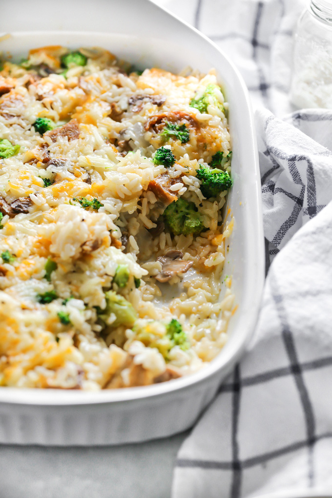 Vegan Cheesy Broccoli Sausage Rice Bake - is loaded with broccoli, rice, sausage, mushrooms and all finished off with a super melty cheesy topping. NeuroticMommy.com #vegandinner