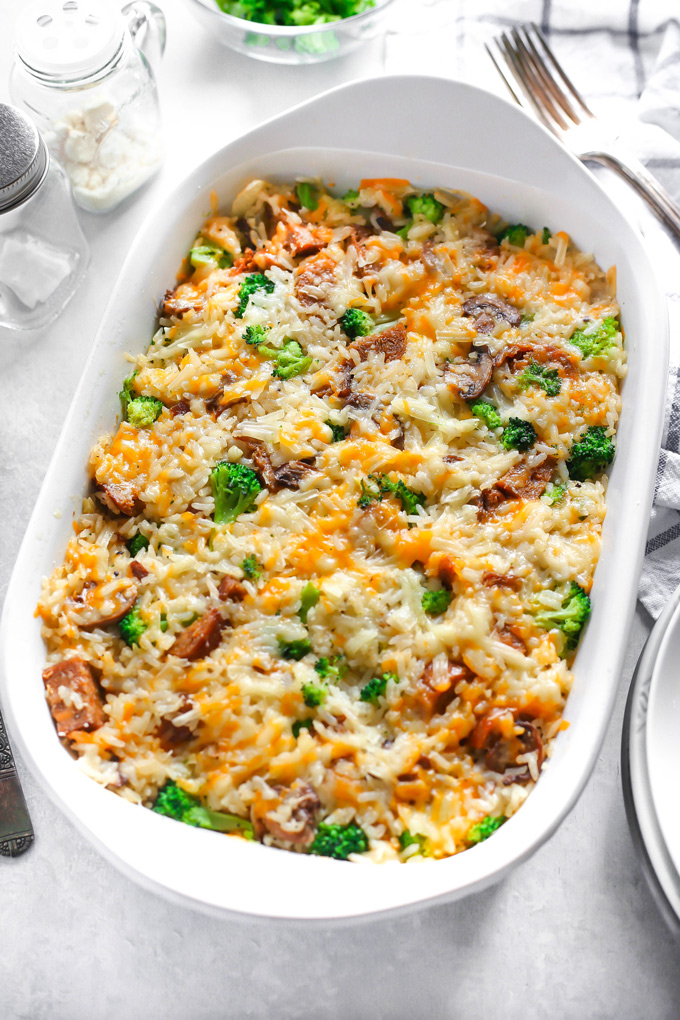 Vegan Cheesy Broccoli Sausage Rice Bake - is loaded with broccoli, rice, sausage, mushrooms and all finished off with a super melty cheesy topping. NeuroticMommy.com #vegandinner