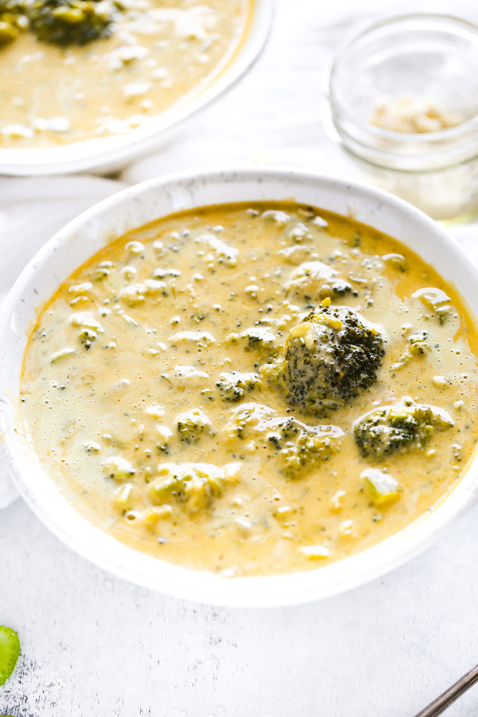 Vegan Broccoli Cheddar Soup - Cozy, warming and loaded with healing foods like broccoli, celery, and cashews. So creamy and full of cheddar flavor! NeuroticMommy.com #vegan #soup