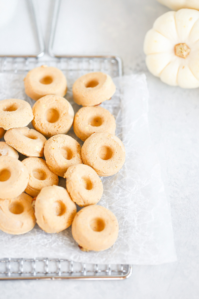 Vegan Pumpkin Cheesecake Doughnut Fat Bombs - Yum pumpkin doughnut creamy cheesecake goodness that will help you reach your fat goal & keep you in ketosis! And the perfect fall, holiday treat! NeuroticMommy.com #vegan #keto