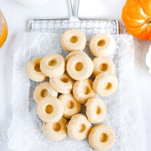 Vegan Pumpkin Cheesecake Doughnut Fat Bombs - Yum pumpkin doughnut creamy cheesecake goodness that will help you reach your fat goal & keep you in ketosis! And the perfect fall, holiday treat! NeuroticMommy.com #vegan #keto