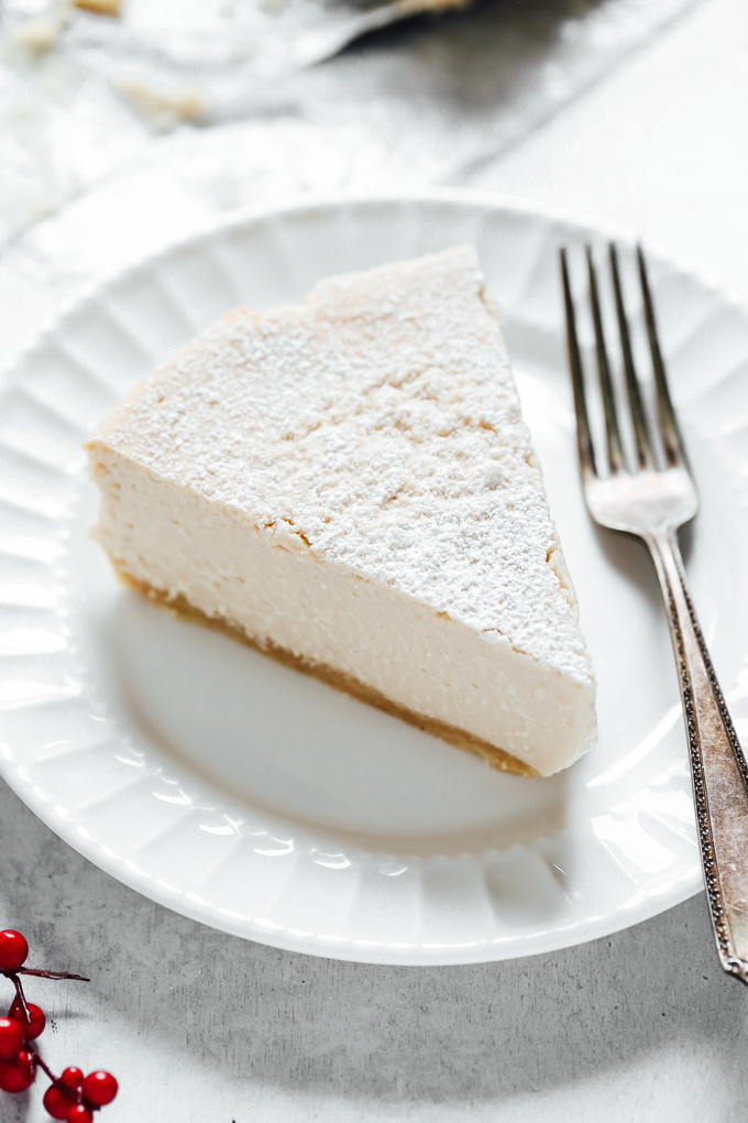 Vegan Keto Classic Style Cheesecake - A creamy plain cheesecake with a delicious buttery crust. Super easy and will be eaten by anyone, it's that good. Neuroticmommy.com #vegan #veganketo #cheesecake #christmas #holidays